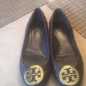 Tory Burch brown quilted flats.